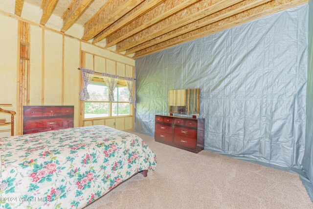 189 Flood Rd, Westerlo, NY 12193 - carpeted bedroom featuring beam ceiling