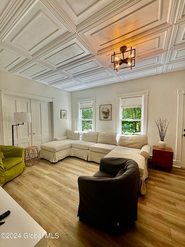 interior space featuring hardwood / wood-style flooring and a notable chandelier