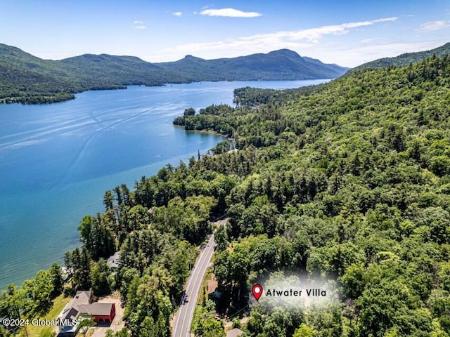 bird's eye view featuring a water and mountain view