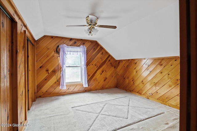 bonus room with vaulted ceiling, carpet, and ceiling fan