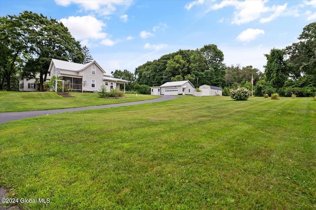 view of yard featuring a garage