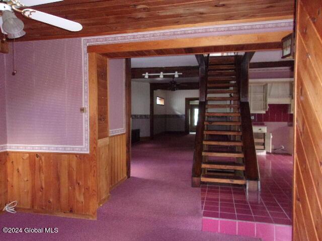 2119 Broadway, Schenectady, NY 12306 - corridor with a wainscoted wall, wood walls, and carpet floors