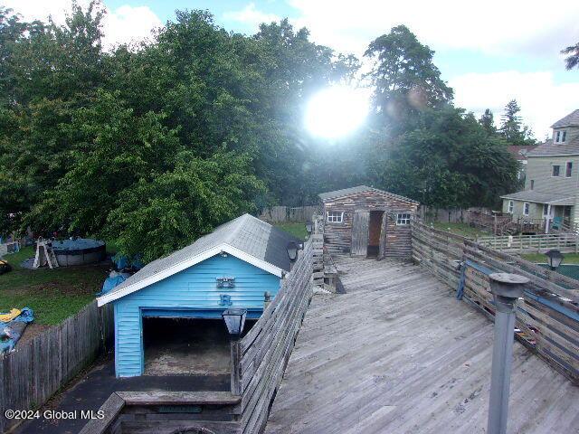 2119 Broadway, Schenectady, NY 12306 - exterior space featuring a shed, an outdoor structure, and fence