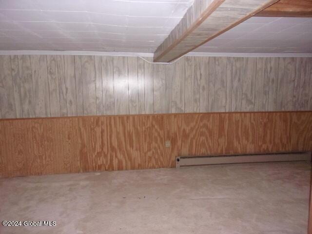 2119 Broadway, Schenectady, NY 12306 - interior space featuring wood walls and a baseboard heating unit
