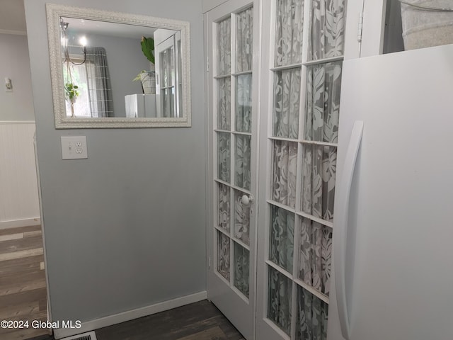 bathroom featuring wainscoting and wood finished floors