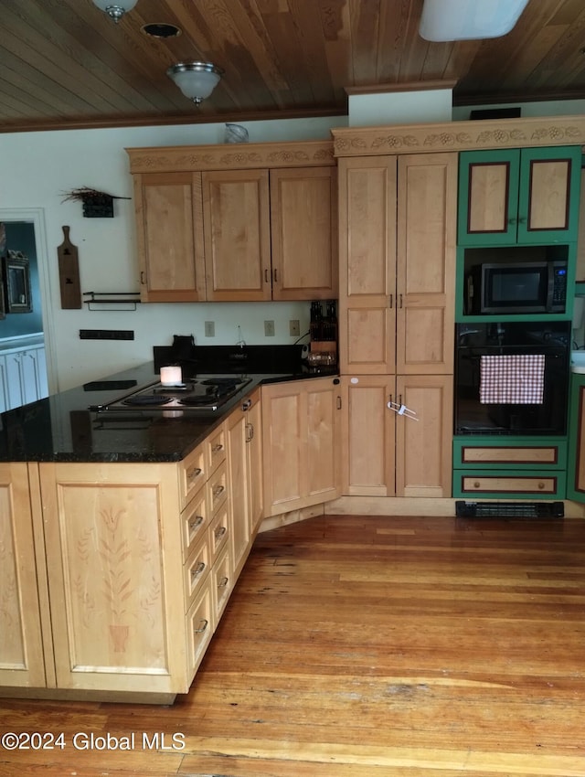 kitchen with light wood finished floors, light brown cabinetry, oven, electric cooktop, and wooden ceiling