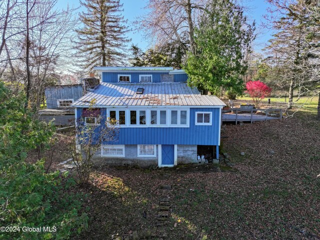 17 Old Port Way, Crown Point, NY 12928 - back of house featuring metal roof