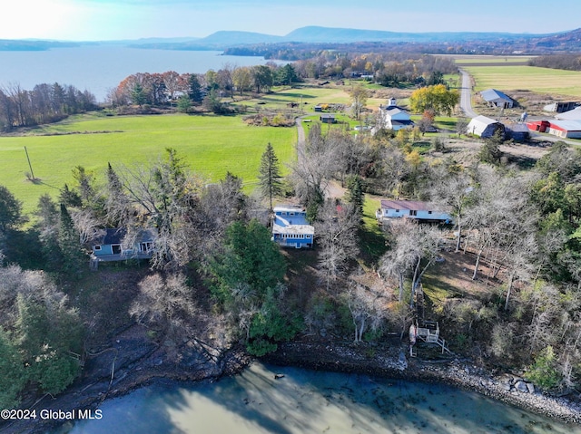 drone / aerial view with a mountain view and a rural view