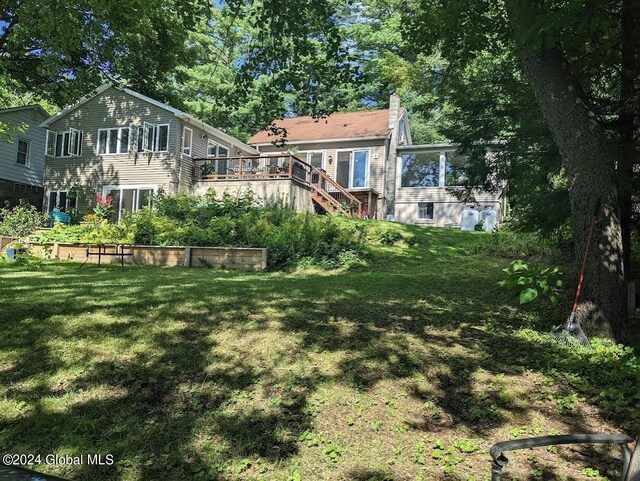 view of yard featuring a deck