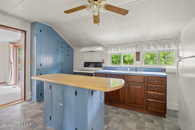 kitchen featuring white appliances, light tile patterned flooring, ceiling fan, sink, and vaulted ceiling