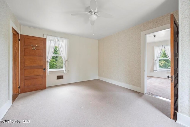 empty room with ceiling fan