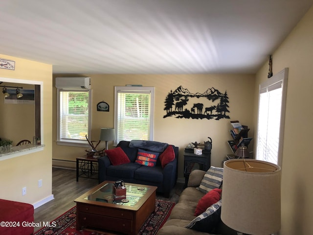 living room featuring dark hardwood / wood-style floors, a wall mounted AC, and baseboard heating