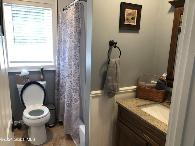 full bathroom with vanity, toilet, and shower / bathtub combination with curtain