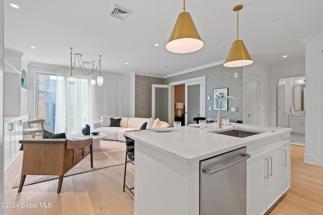 kitchen featuring visible vents, a sink, stainless steel dishwasher, crown molding, and wallpapered walls