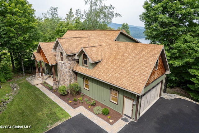 view of side of property with a yard