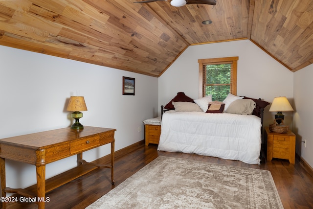 bedroom featuring dark hardwood / wood-style floors, vaulted ceiling, and wood ceiling