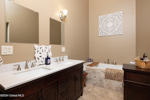 bathroom featuring tile patterned floors, dual bowl vanity, and a relaxing tiled tub