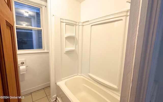 bathroom with shower / tub combination and tile patterned flooring