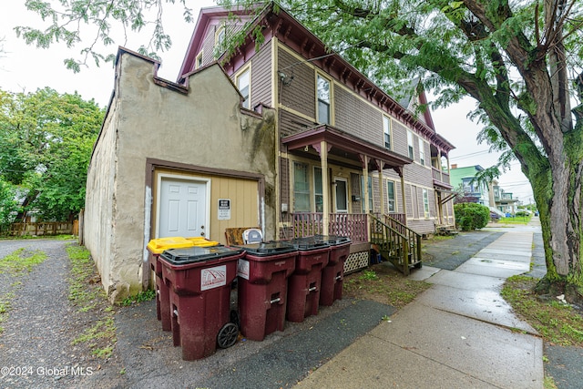 view of home's exterior with covered porch