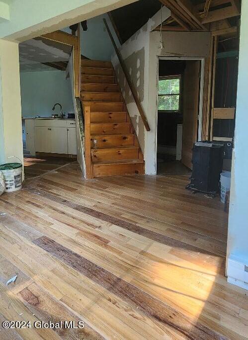 interior space with hardwood / wood-style flooring