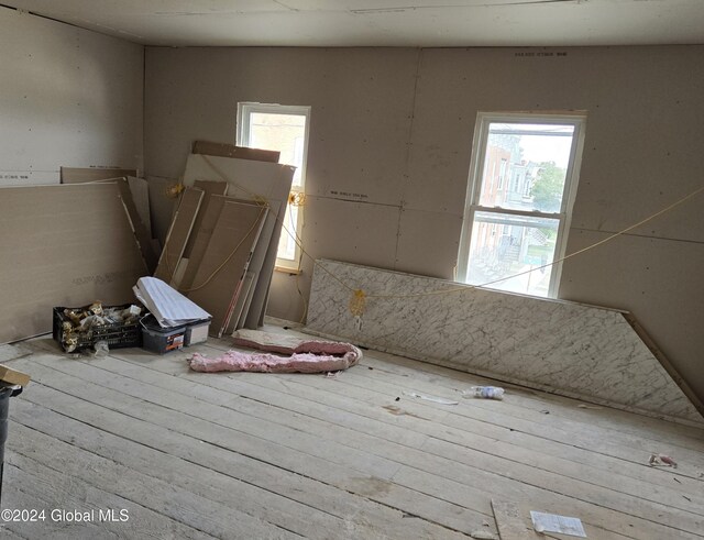 miscellaneous room featuring wood-type flooring