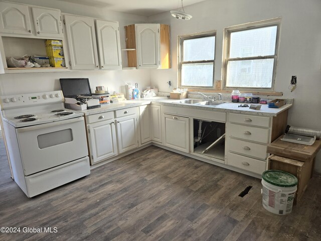 kitchen featuring sink, white cabinetry, hanging light fixtures, electric range, and dark hardwood / wood-style flooring