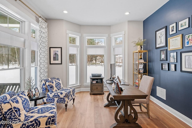 office with light hardwood / wood-style floors