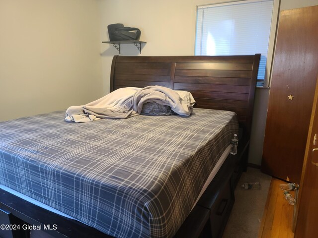 bedroom featuring carpet flooring