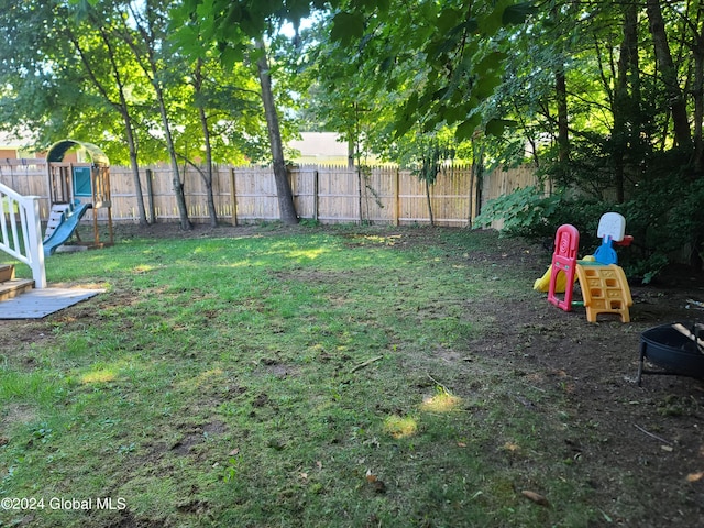 21 Foxhall Dr, Saratoga Springs, NY 12866 - view of yard with a playground and fence private yard