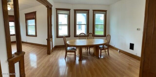 unfurnished dining area featuring light hardwood / wood-style floors