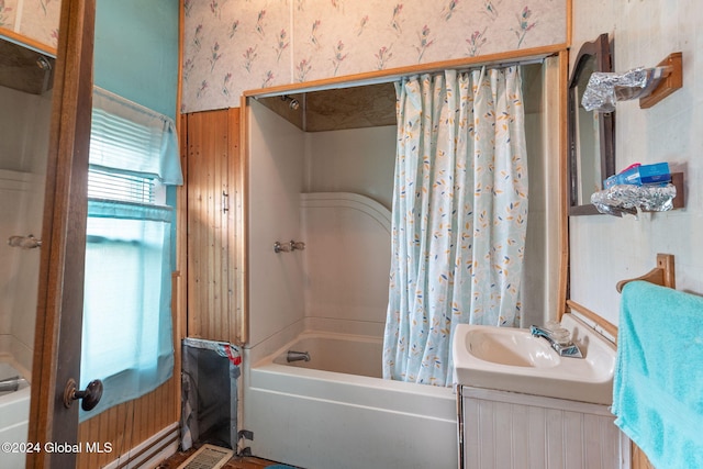 bathroom featuring vanity and shower / bath combo