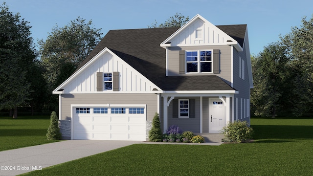 view of front facade with a front lawn and a garage