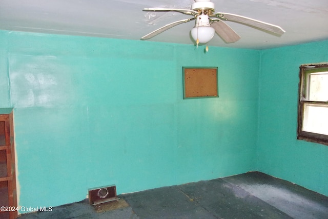 unfurnished room with ceiling fan