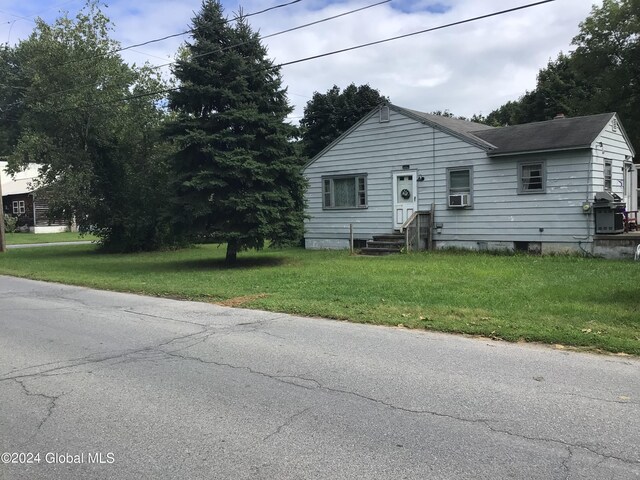 view of front of home with a front yard