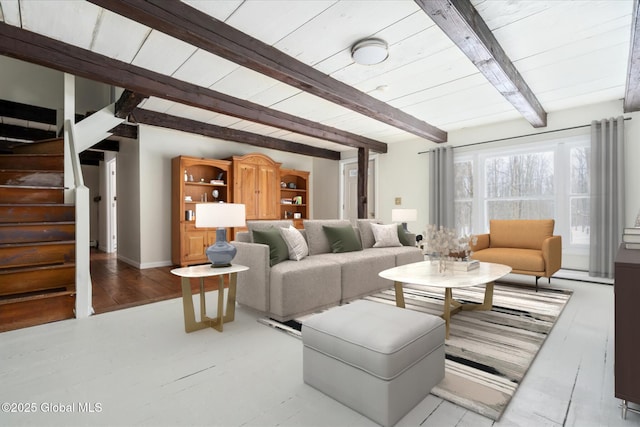 living room with beam ceiling, stairway, wood ceiling, and wood finished floors