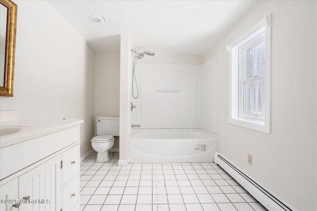 full bathroom featuring vanity, tile patterned flooring, shower / washtub combination, toilet, and baseboard heating