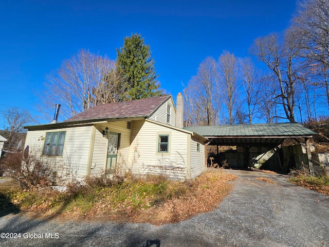 view of front of house with a carport