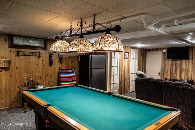 rec room featuring wooden walls and billiards