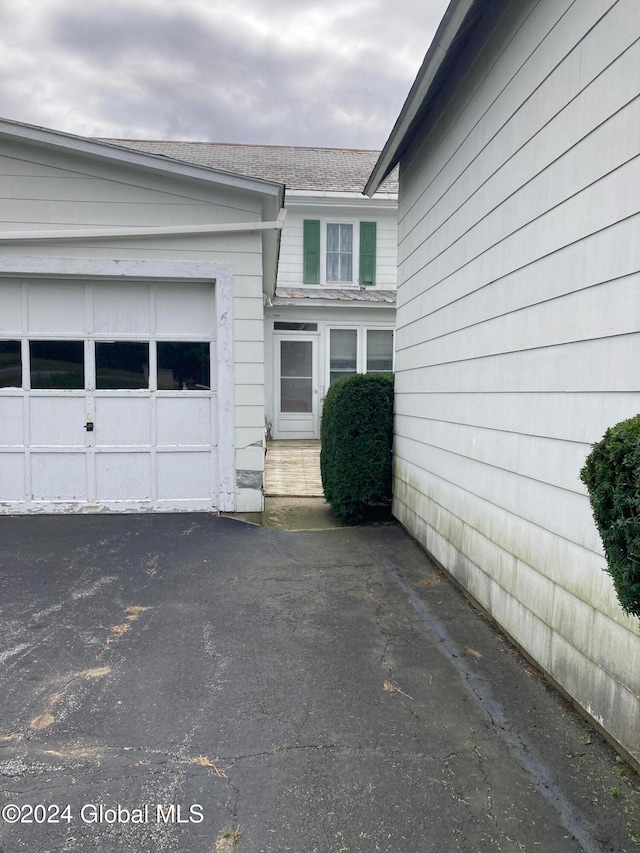 view of home's exterior featuring a garage