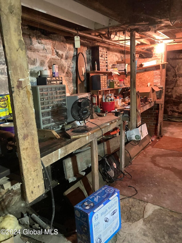 basement with a workshop area