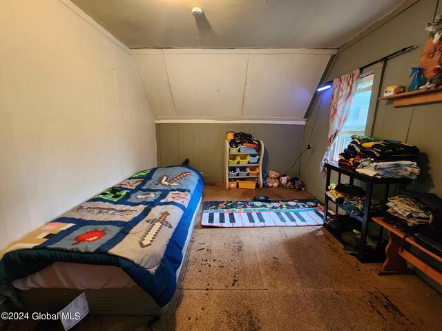 bedroom with vaulted ceiling