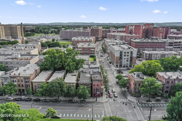 birds eye view of property featuring a view of city