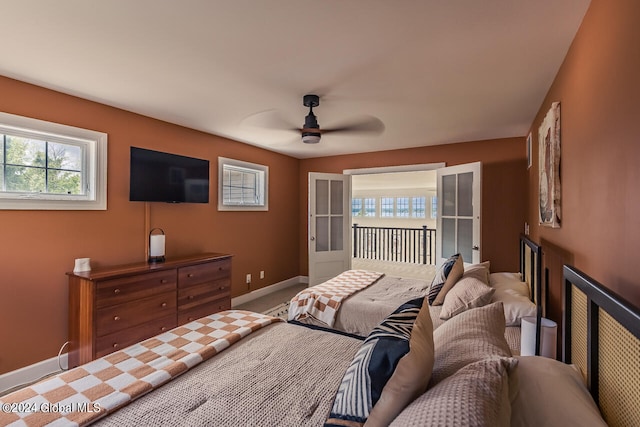 bedroom with ceiling fan and carpet floors