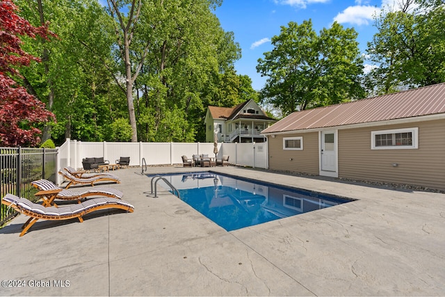 view of pool with a patio