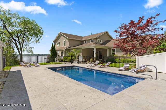 view of swimming pool featuring a patio