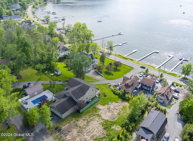 birds eye view of property featuring a water view