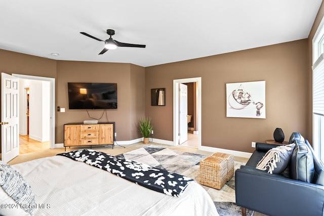 bedroom with ceiling fan and ensuite bathroom