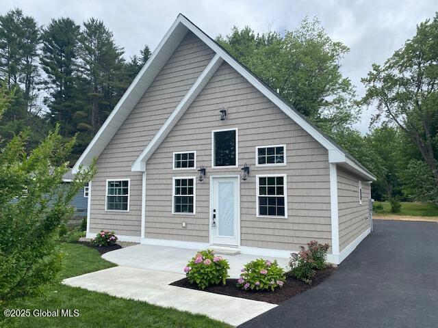 26 N 2nd Ave, Broadalbin, NY 12025 - view of front of home with a patio