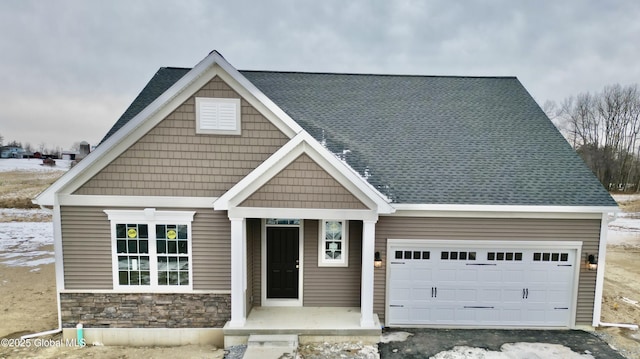 craftsman-style house with a garage