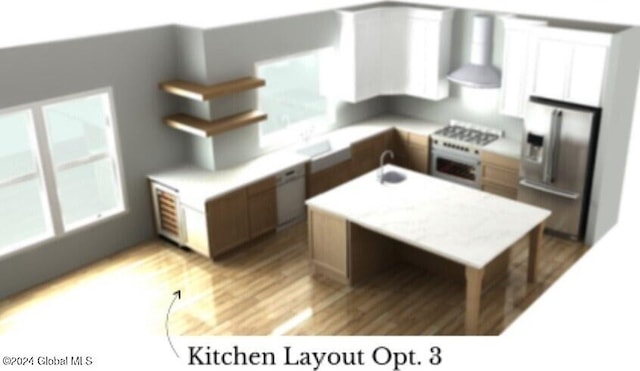 kitchen with white range, wall chimney range hood, sink, stainless steel fridge, and light wood-type flooring